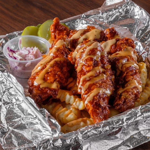 Hot Nashville Chicken Tenders with Fries.